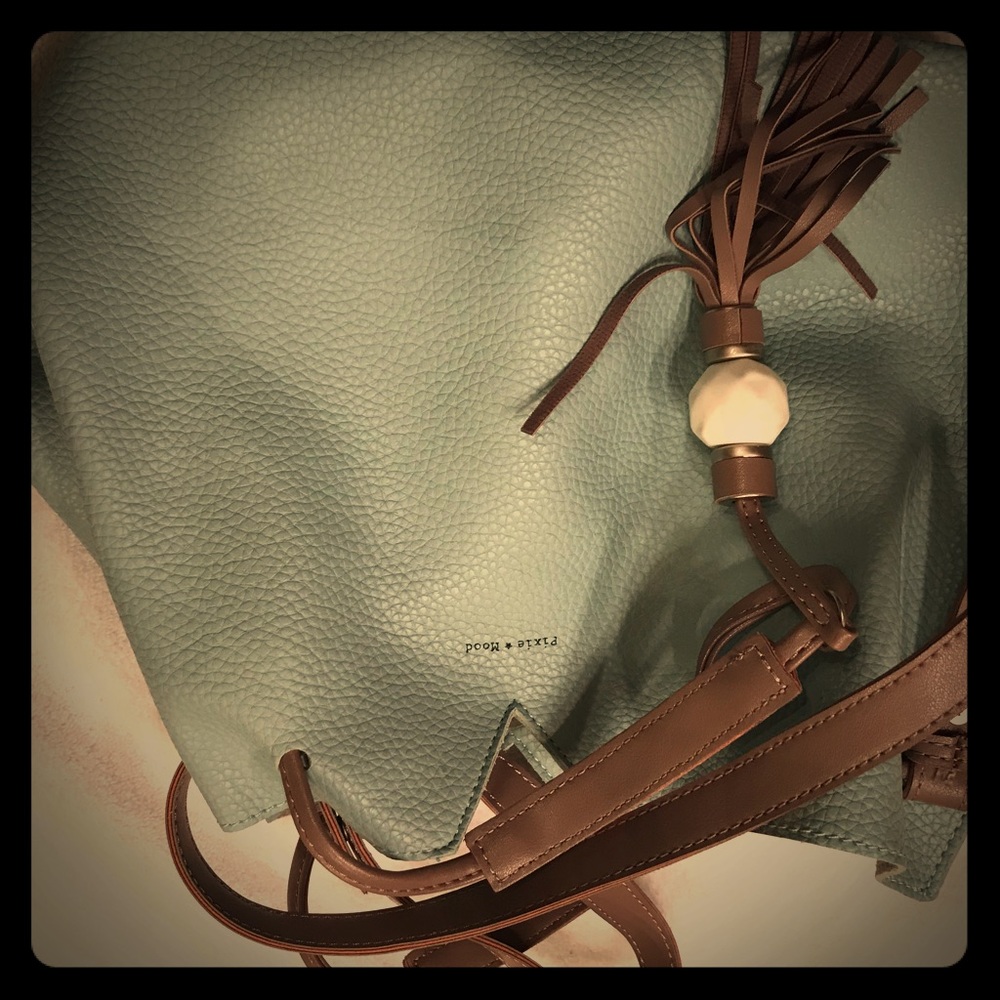 Stylish and unique vegan handbag brand new